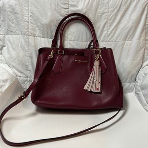 Michael Kors burgundy handbag, with alternate long strap.